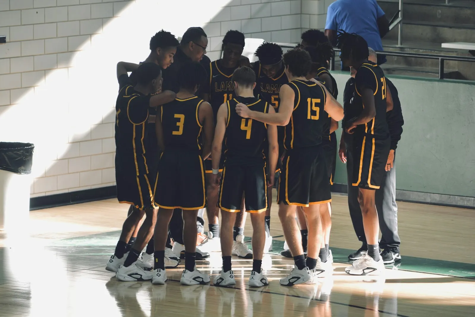 A basketball team on court